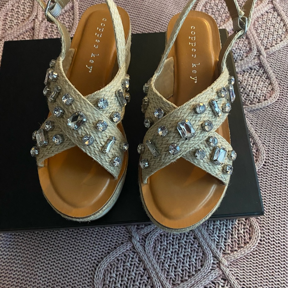 Beautiful brand new bling sandals purchased at Dillards. Size 9